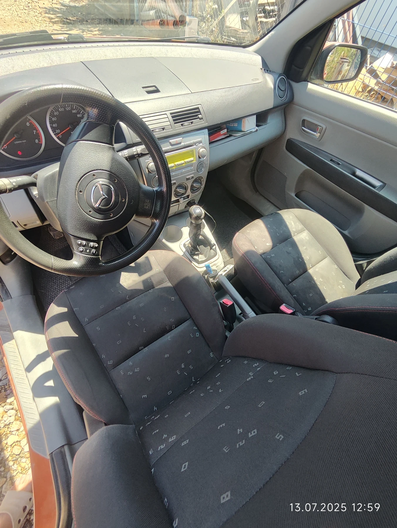 Mazda 2  - изображение 7