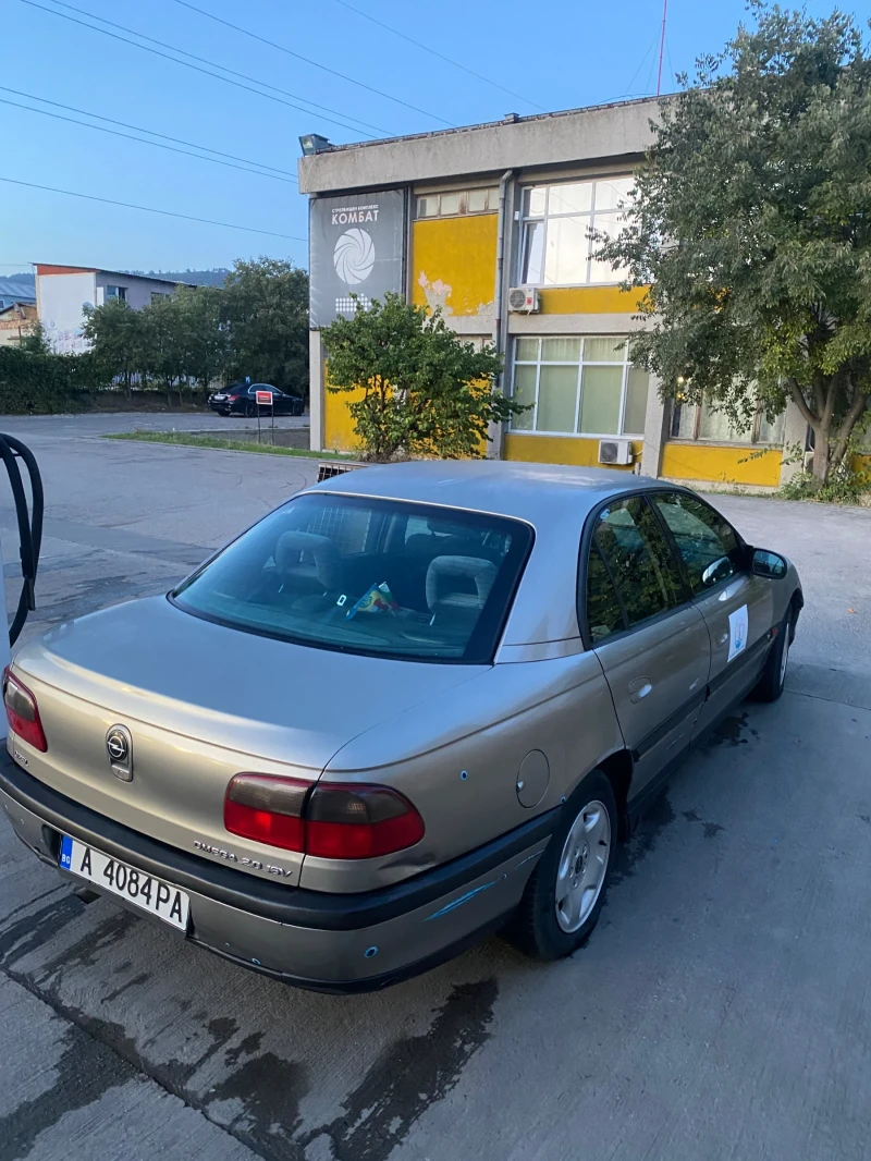 Opel Omega B, снимка 9 - Автомобили и джипове - 47370460