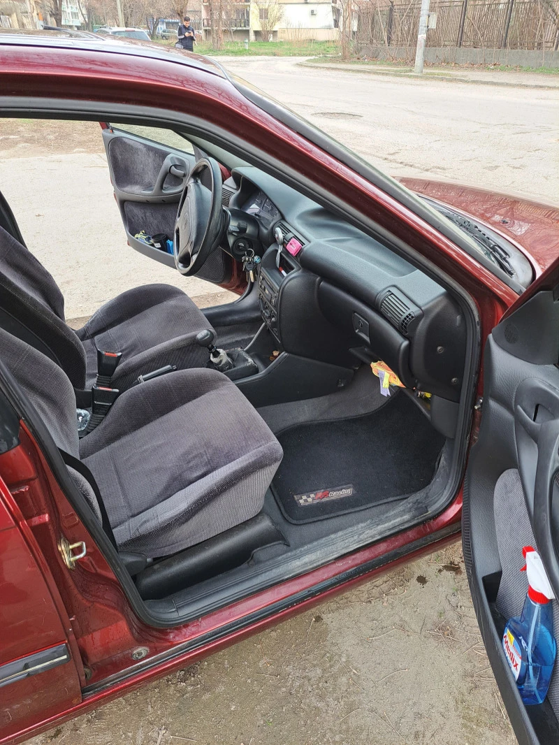 Opel Astra 1.6i, снимка 16 - Автомобили и джипове - 46681816