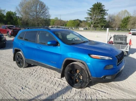 ������ Jeep Cherokee