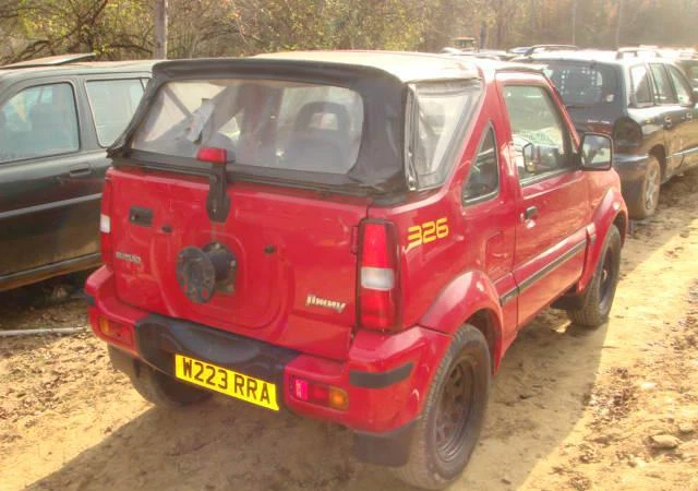 Suzuki Jimny 1.3i, снимка 2 - Автомобили и джипове - 46834009