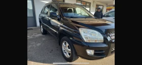 Kia Sportage 2.0i 4x4 exclusive, снимка 1