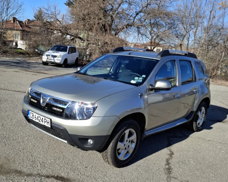 Dacia Duster 1, 6 БЕНЗИН-ГАЗ 4х4, снимка 11 - Автомобили и джипове - 49378048