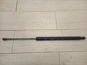 Амортисьор заден капак ляв Фолксваген Голф 7 (ч)