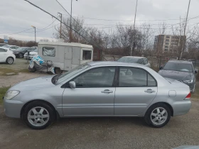 Mitsubishi Lancer 1.6i BiFuel Фабр.Газ, снимка 2