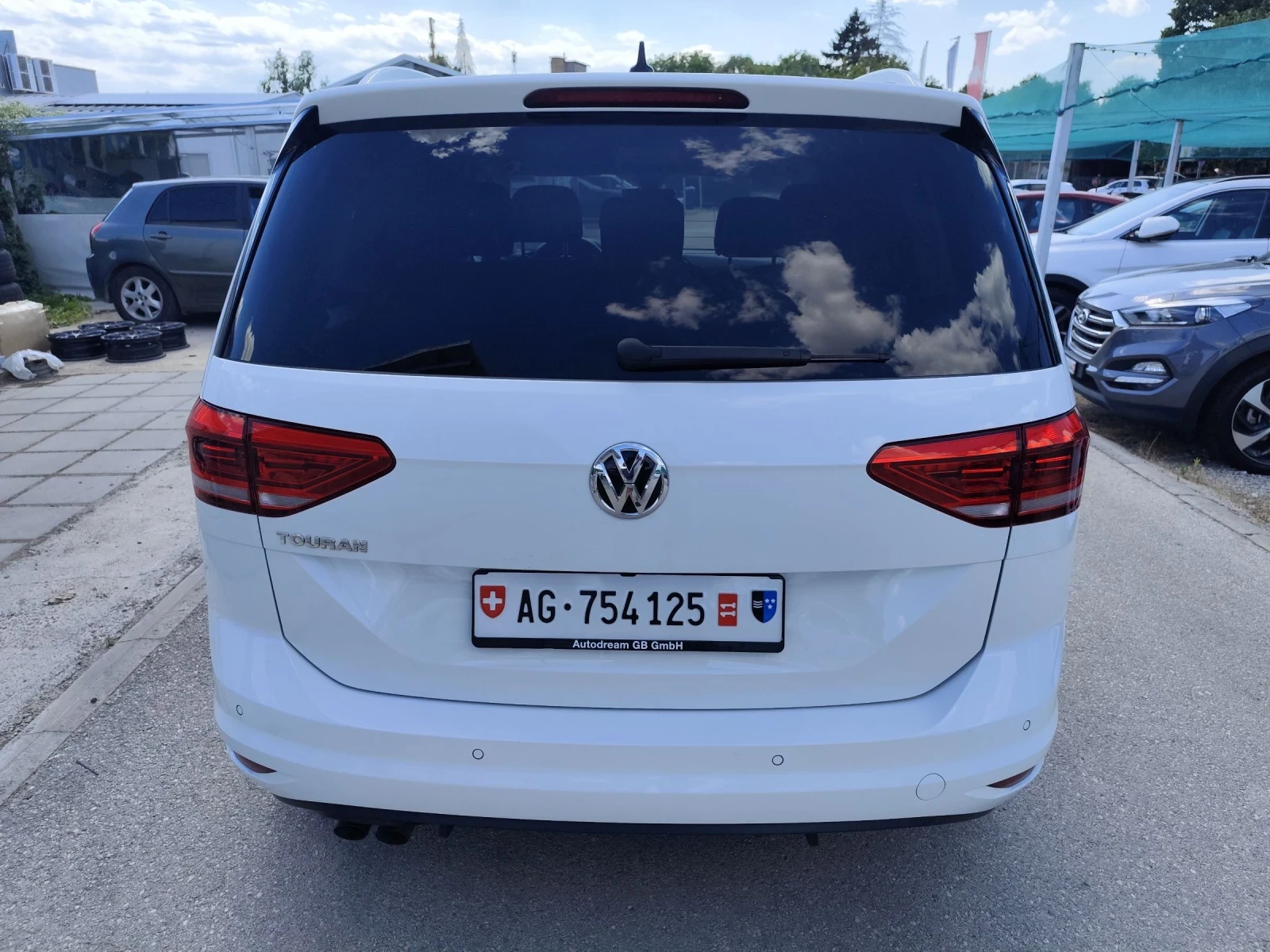 VW Touran 2.0 TDI Highline Швейцария  - изображение 6