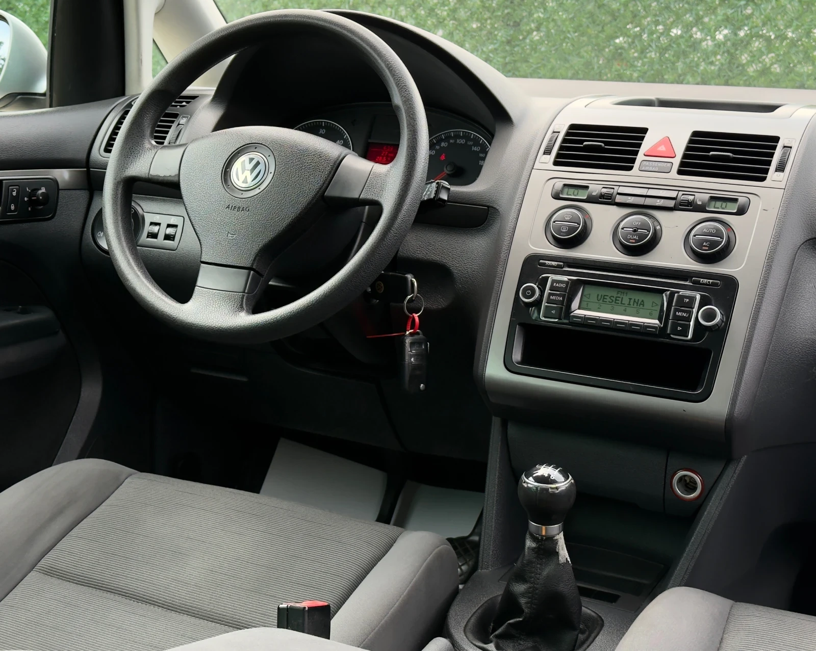 VW Touran 1.9TDi 90hp  * XENON* FACELIFT* , снимка 12 - Автомобили и джипове - 51394812