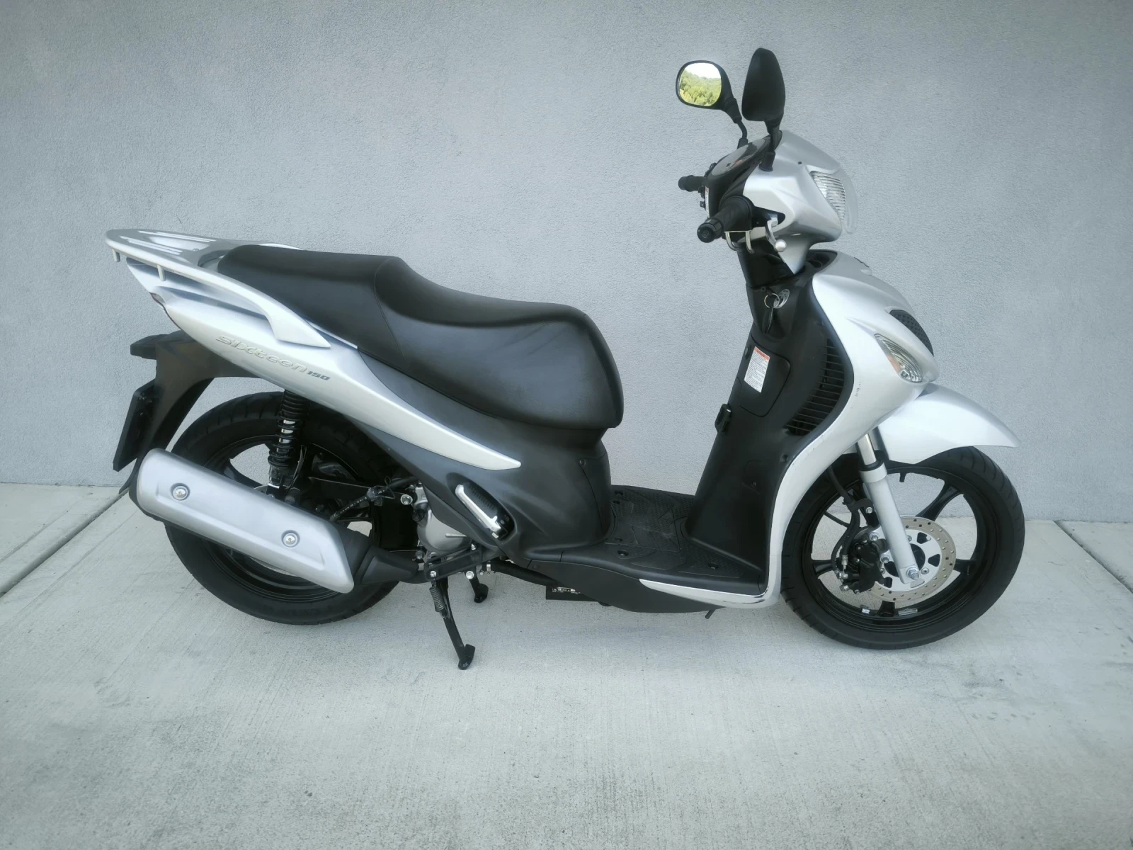 Suzuki Sixteen 150i, 14109 km, 2009 година, снимка 1