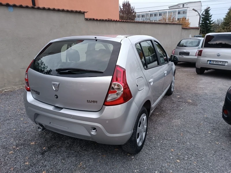 Dacia Sandero 1.4i 75kc/ГАЗ* КЛИМАТИК* , снимка 4 - Автомобили и джипове - 47177256