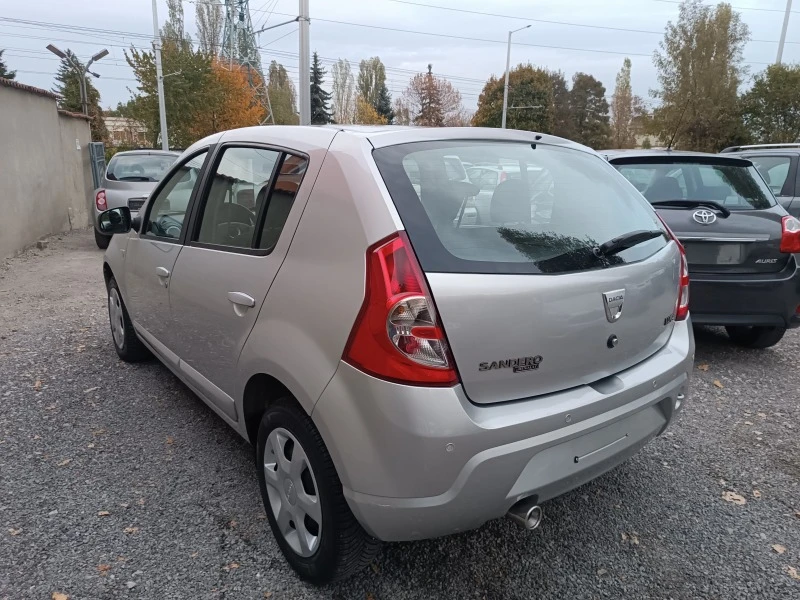 Dacia Sandero 1.4i 75kc/ГАЗ* КЛИМАТИК* , снимка 5 - Автомобили и джипове - 47747114