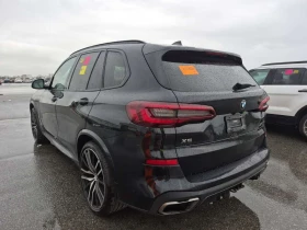BMW X5 M50I* ЛАЗЕРИ* ДИСТРОНИК* ОБДУХВАНЕ* H/K* PANO*  - 36700 € / 71778.96 лв. - 48711446 4