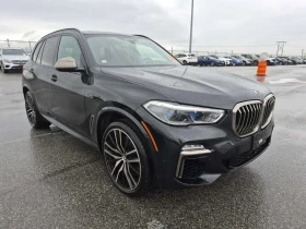 BMW X5 M50I* ЛАЗЕРИ* ДИСТРОНИК* ОБДУХВАНЕ* H/K* PANO*  - 36700 € / 71778.96 лв. - 48711446 2