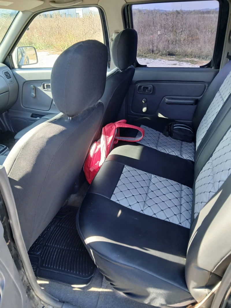 Nissan Navara 2.5, снимка 10 - Автомобили и джипове - 52213898