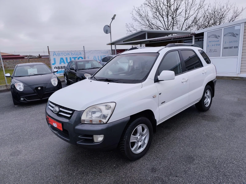 Kia Sportage 2.0i 4x4, снимка 7 - Автомобили и джипове - 53503792