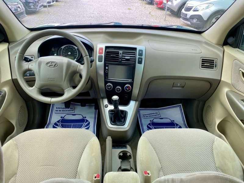 Hyundai Tucson 2, 0 Бензин/газ-4х4, снимка 8 - Автомобили и джипове - 46441355