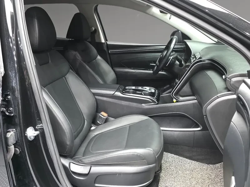Hyundai Tucson 2.0 4WD PREMIUM, снимка 11 - Автомобили и джипове - 56304090