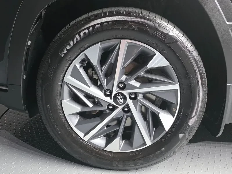 Hyundai Tucson 2.0 4WD PREMIUM, снимка 5 - Автомобили и джипове - 56304090