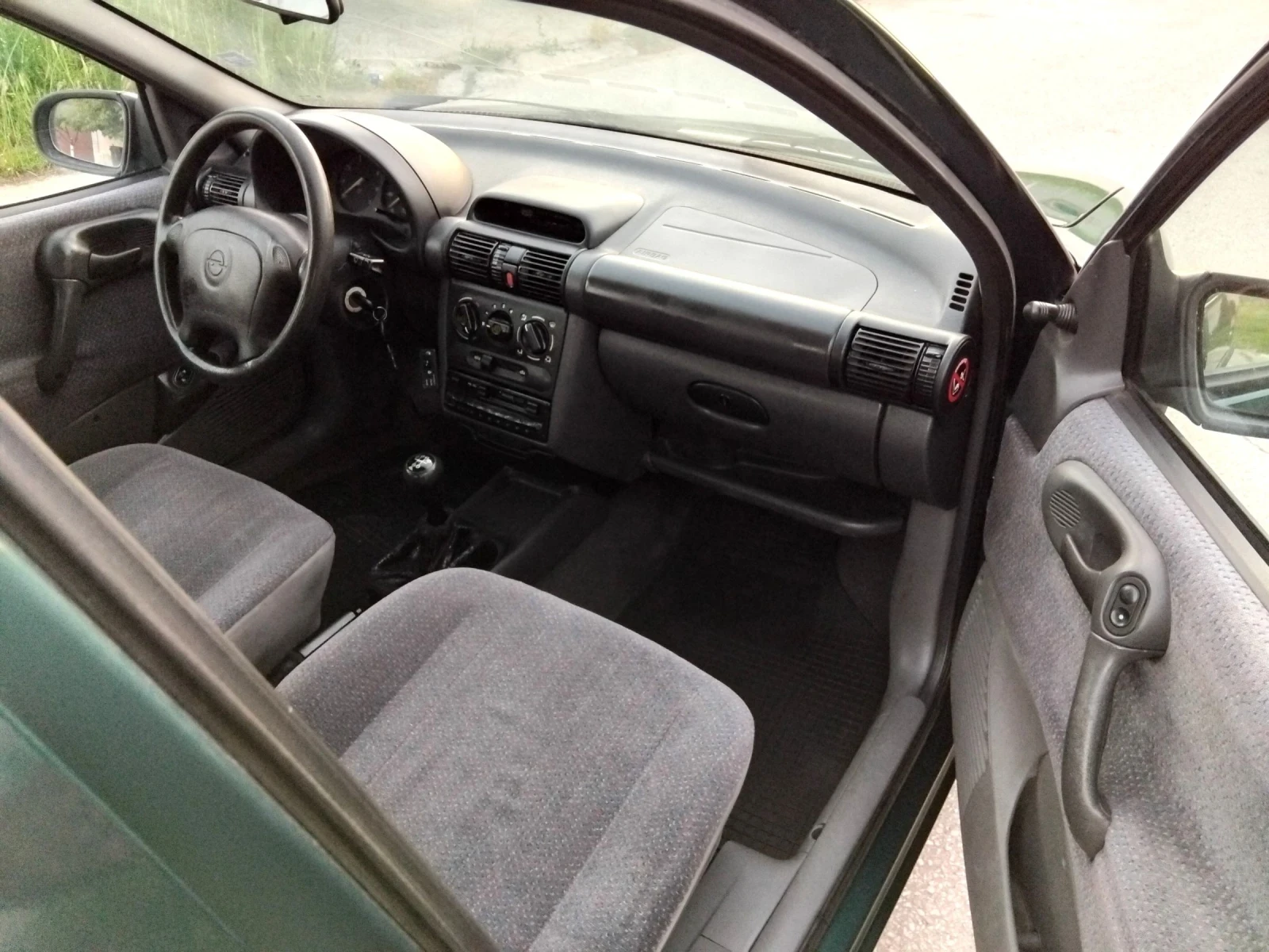 Opel Corsa 1.4.МОНО.75 + КЛИМА + ГАЗ , снимка 17 - Автомобили и джипове - 54683058
