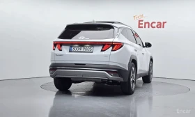 Hyundai Tucson 1.6* HYBRID* AWD* ПОДГРЕВ* ОБДУХВАНЕ* 360КАМЕРА*  - 24500 € / 47917.83 лв. - 94373097 4