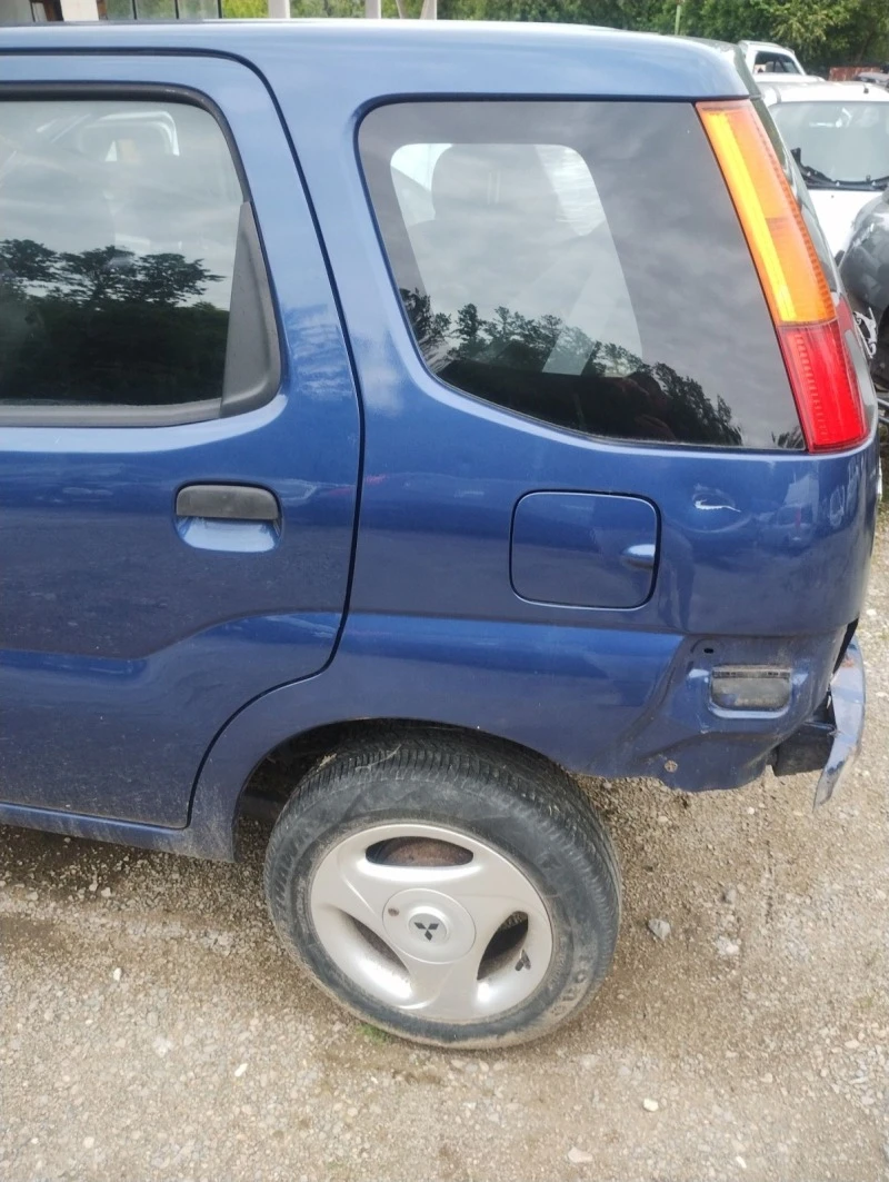 Suzuki Ignis 1. 3 4x4 i 2wD, снимка 3 - Автомобили и джипове - 27695330