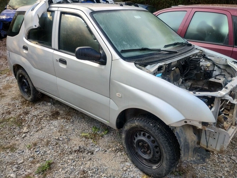 Suzuki Ignis 1. 3 4x4 i 2wD, снимка 4 - Автомобили и джипове - 27695330