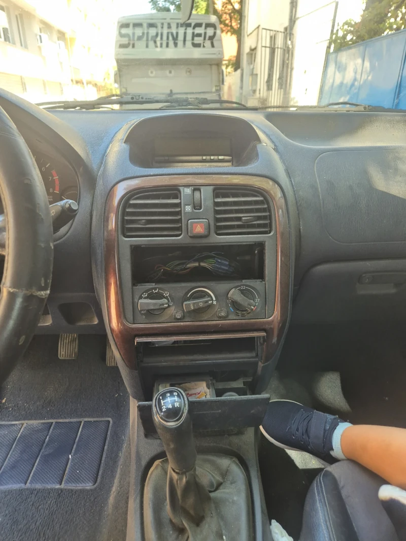 Mitsubishi Carisma 1.8 GDI, снимка 13 - Автомобили и джипове - 52343110