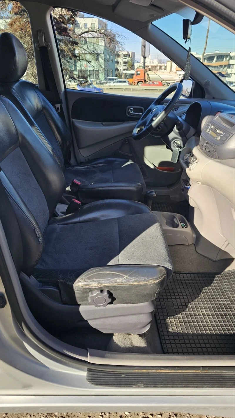 Nissan Almera tino, снимка 9 - Автомобили и джипове - 52536847