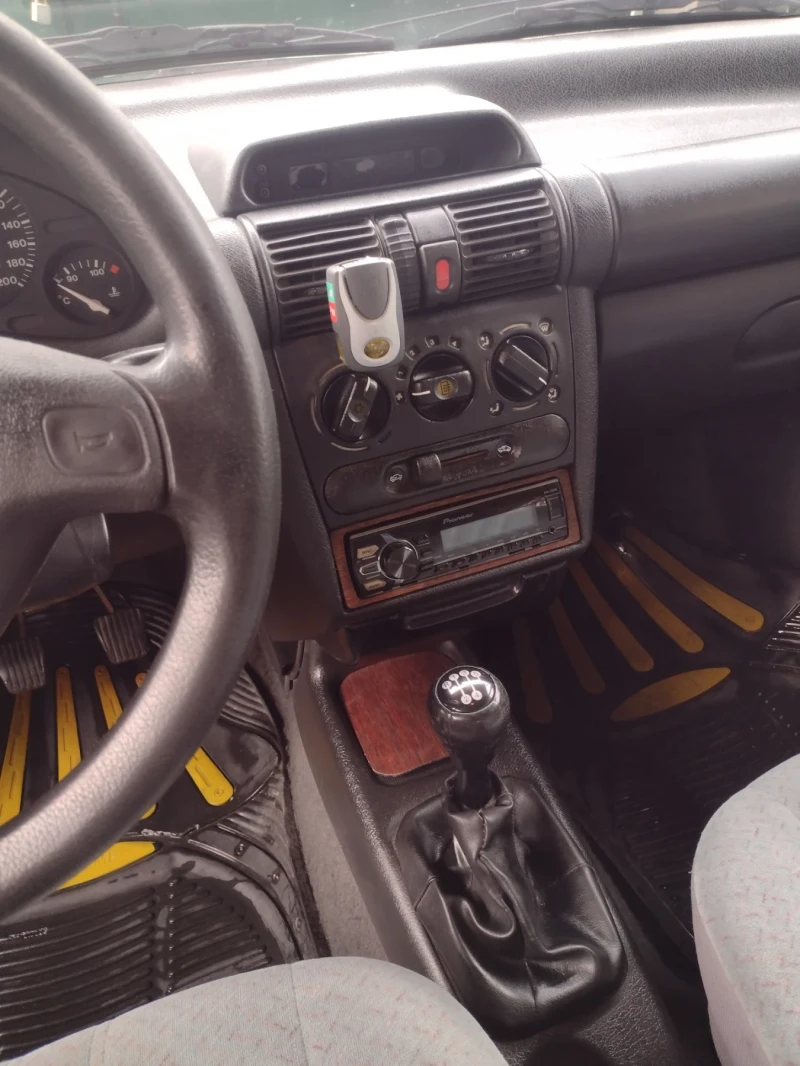 Opel Corsa 1.4 16v, снимка 6 - Автомобили и джипове - 53572151