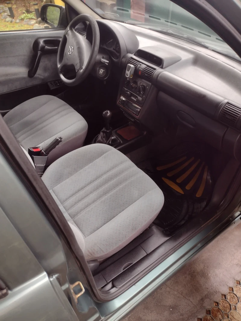 Opel Corsa 1.4 16v, снимка 15 - Автомобили и джипове - 53572151