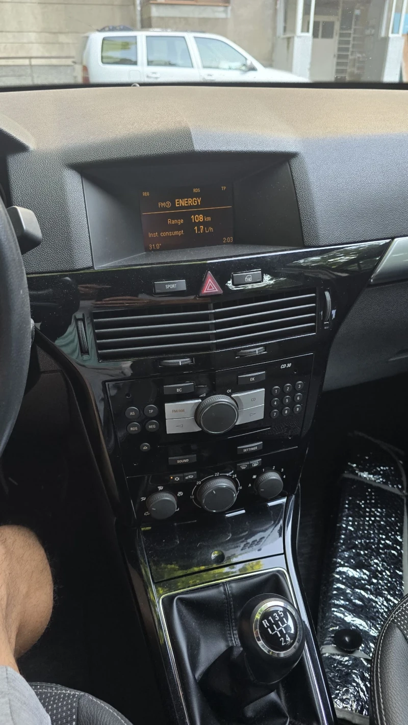 Opel Astra H, снимка 11 - Автомобили и джипове - 51302458