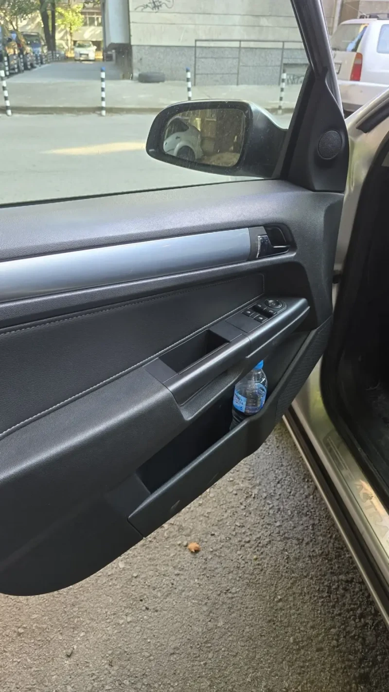 Opel Astra H, снимка 10 - Автомобили и джипове - 51302458