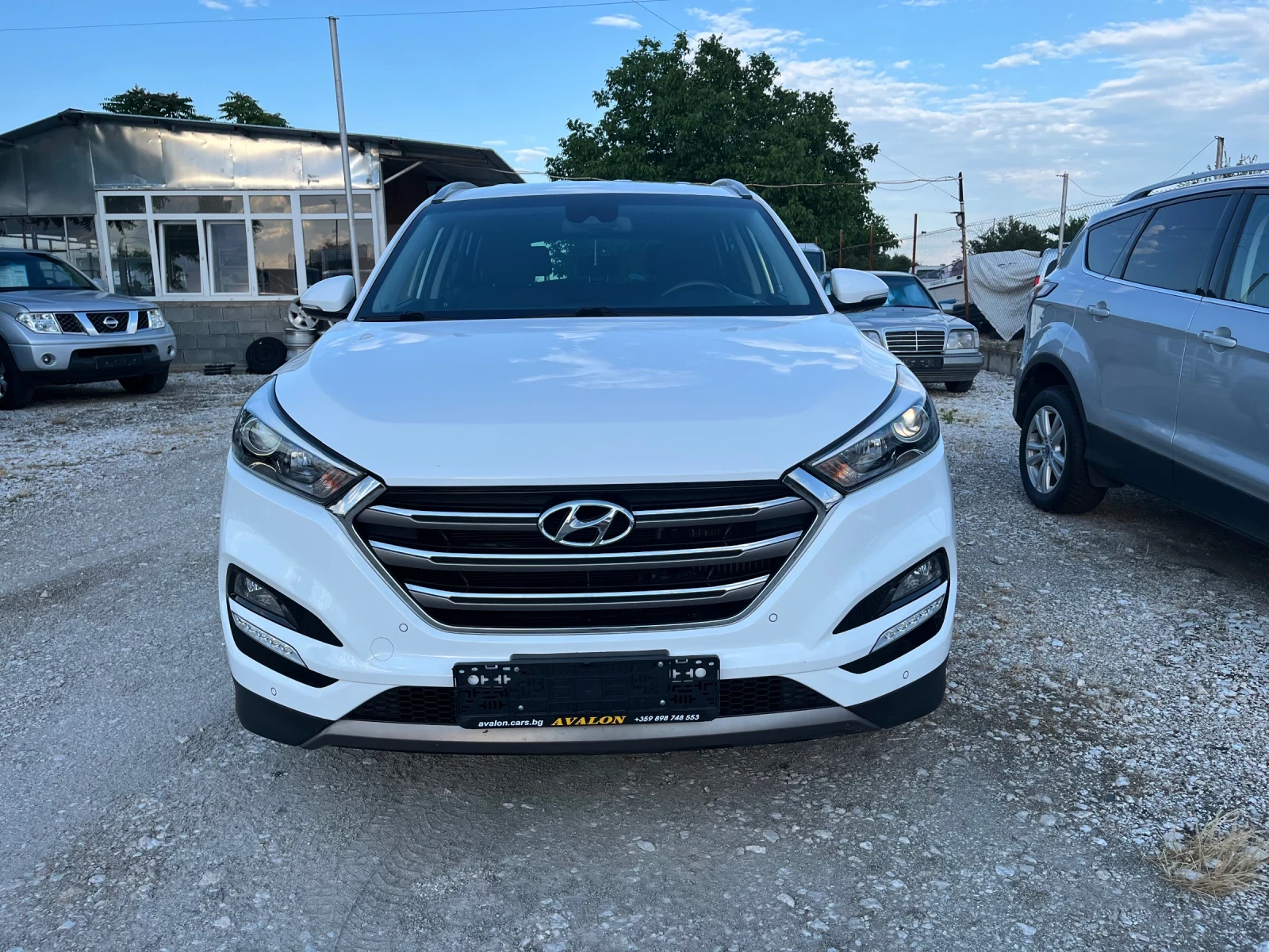 Hyundai Tucson 2.0D 4x4 Автомат Навигация, снимка 2 - Автомобили и джипове - 55027022