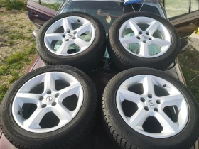        215/55R17  Opel Omega