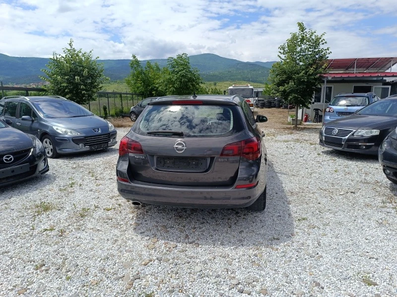 Opel Astra 2.0DTH Sports Tourer , снимка 9 - Автомобили и джипове - 45997004