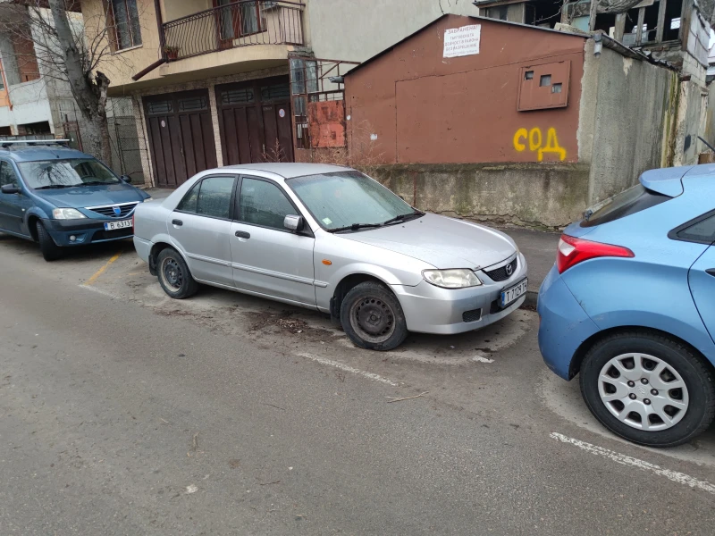 Mazda 323, снимка 1 - Автомобили и джипове - 48486606