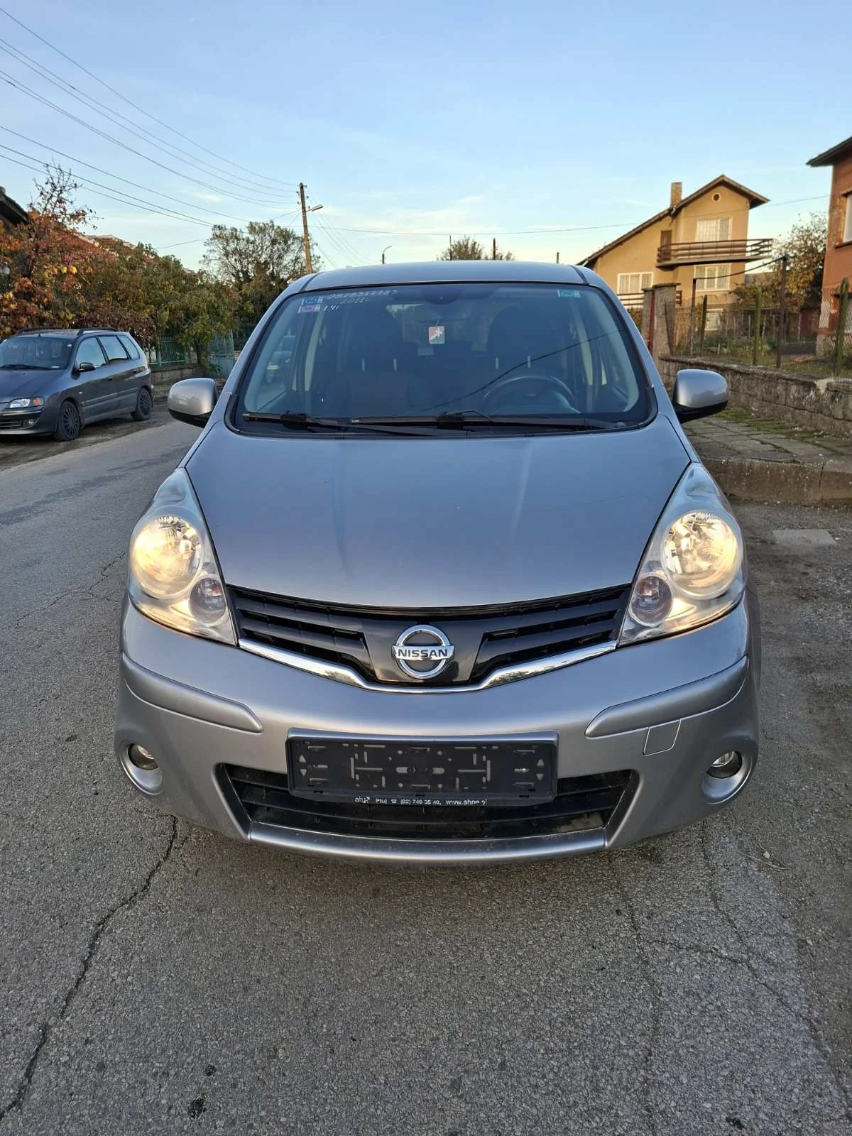 Nissan Note 1.4i-90кс, снимка 13 - Автомобили и джипове - 54689076