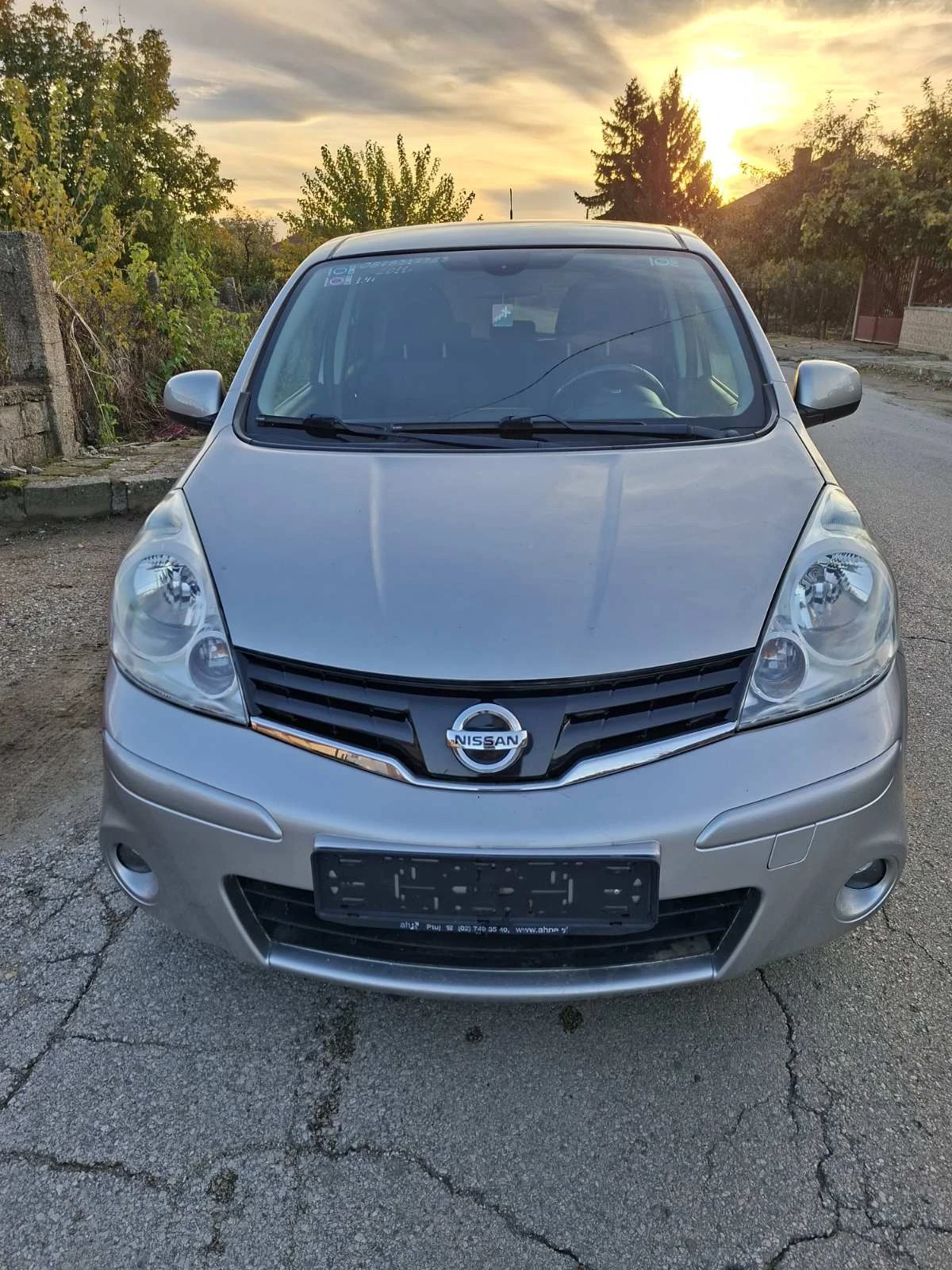 Nissan Note 1.4i-90кс, снимка 11 - Автомобили и джипове - 54689076