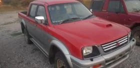 Mitsubishi L200 2.5tdi, снимка 15