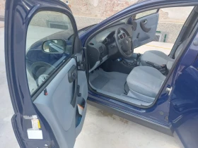 Opel Corsa 1.2  16v 75 кс, снимка 11