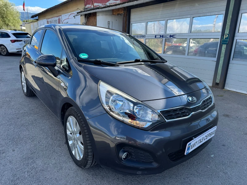 Kia Rio 1.4 16V Swiss, снимка 9 - Автомобили и джипове - 51568668