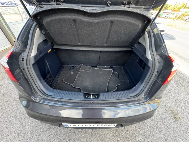 Kia Rio 1.4 16V Swiss, снимка 13 - Автомобили и джипове - 51568668