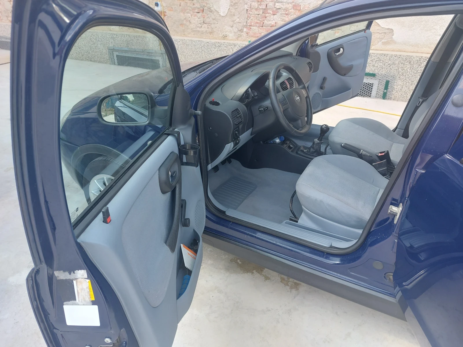 Opel Corsa 1.2  16v 75 кс, снимка 11 - Автомобили и джипове - 55981861