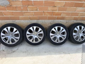 Гуми с джанти Firestone 215/50R17, снимка 1