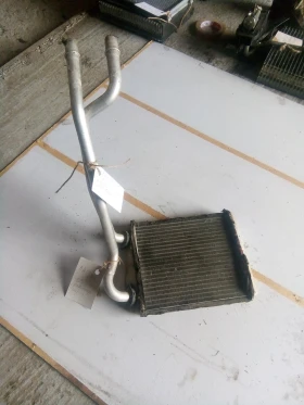 радиатор парно Рено Лагуна 05г.