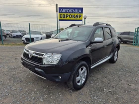 Dacia Duster 1.6i, снимка 1