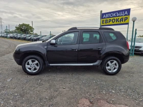 Dacia Duster 1.6i, снимка 2
