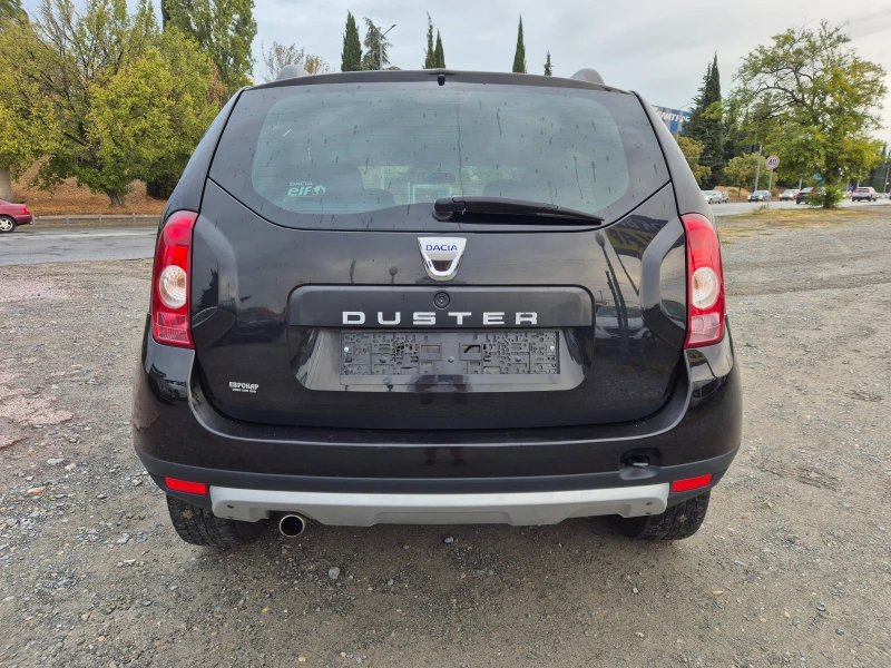Dacia Duster 1.6i, снимка 4 - Автомобили и джипове - 51886732