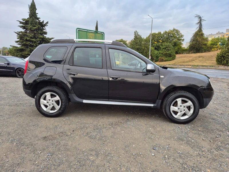 Dacia Duster 1.6i, снимка 6 - Автомобили и джипове - 51886732