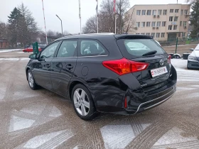 Toyota Auris 1.6i-132кс-ШВЕЙЦАРИЯ-РЪЧКА-6ск-KEYLESS-NAVI - 9999 € / 19556.34 лв. - 86057462 6