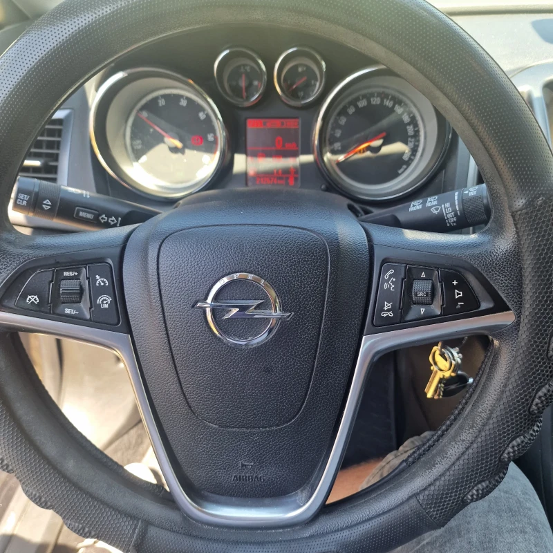 Opel Astra Sports Tourer , снимка 10 - Автомобили и джипове - 52305476